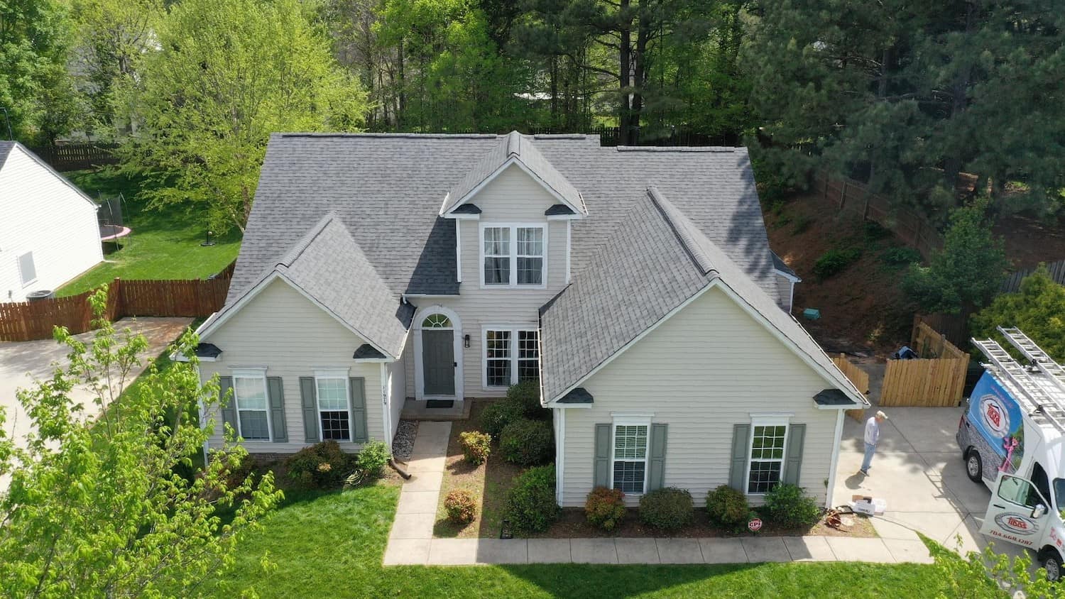 aerial view of huntersville roofing project on residential home
