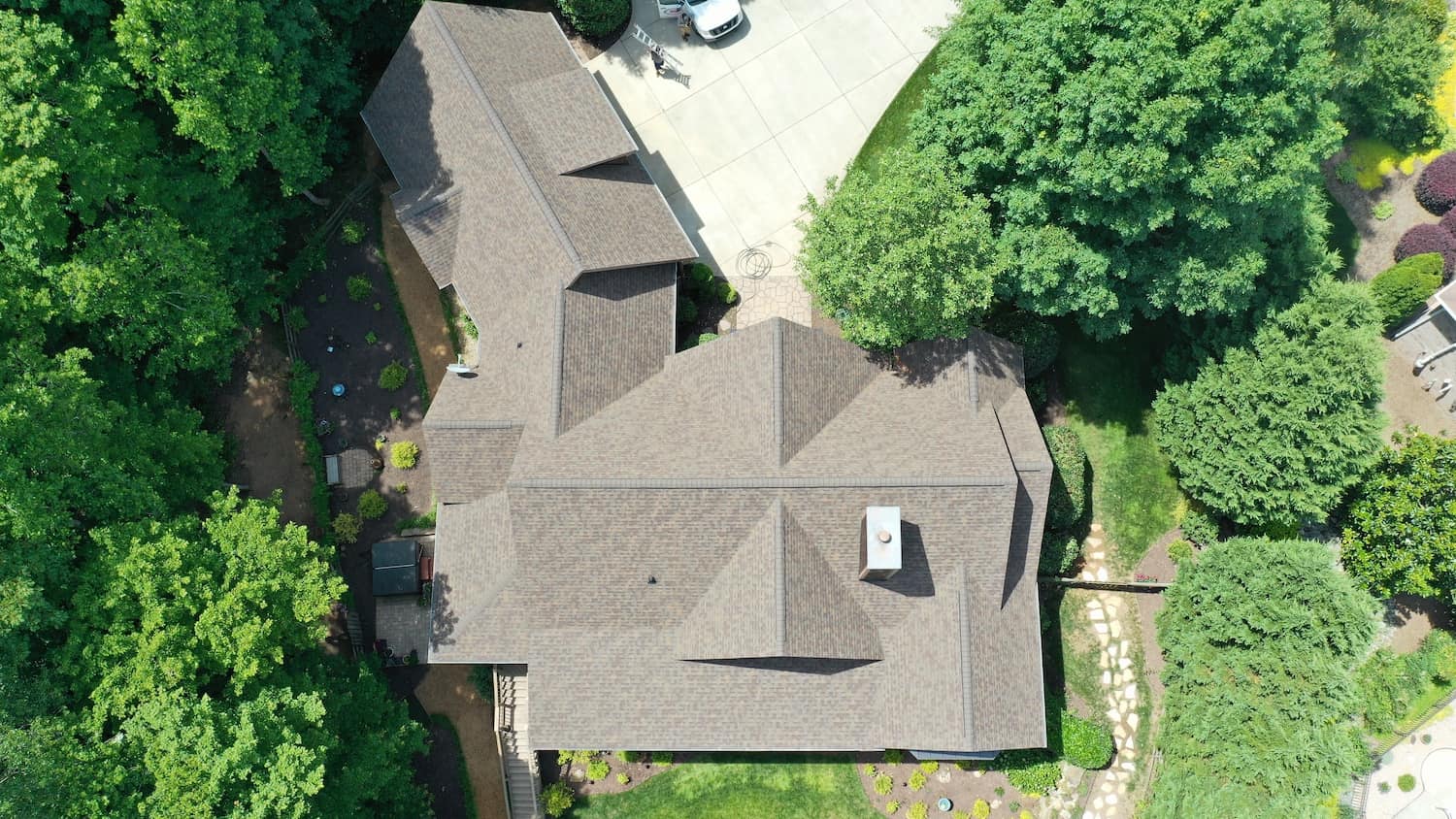 http://top%20aerial%20view%20of%20trudefinition%20duration%20teak%20shingles%20on%20residential%20home%20and%20green%20trees