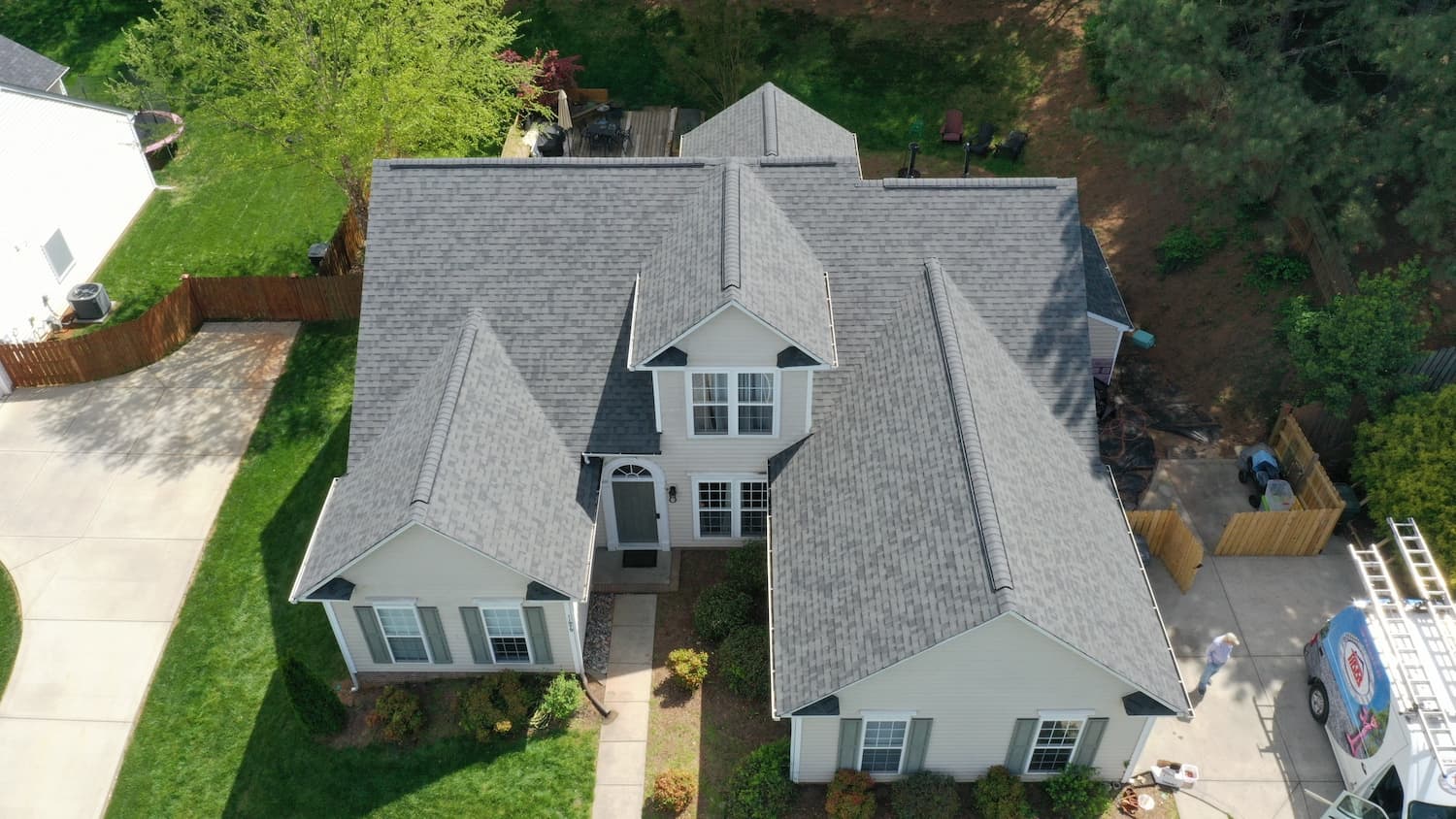 http://trudefinition%20duration%20gray%20shingles%20on%20residential%20home;%20aerial%20view