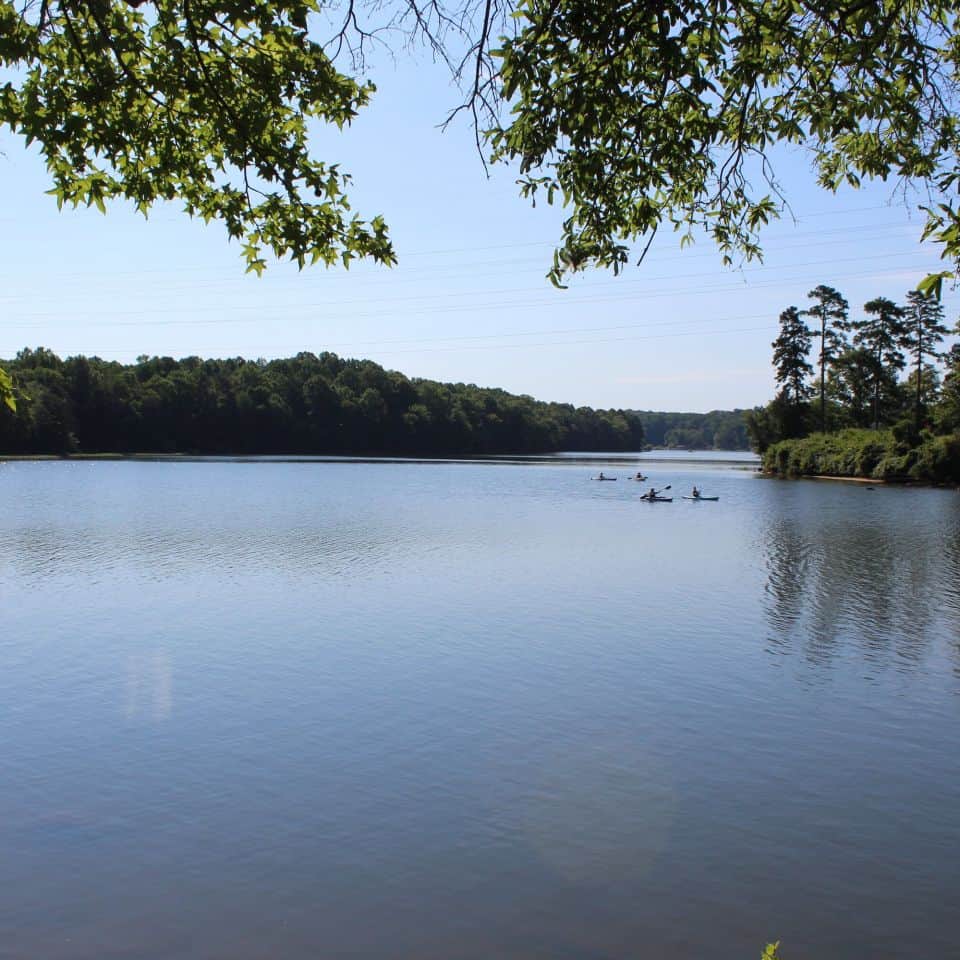 people kayaking at latta nature preserve, one of the most popular parks in huntersville, nc