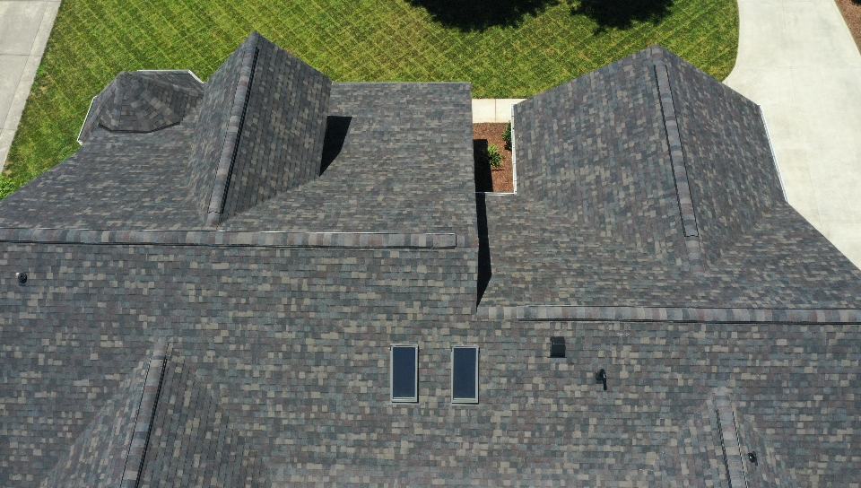 http://close%20up%20aerial%20view%20of%20black%20sable%20duration%20shingles%20on%20residential%20shingles
