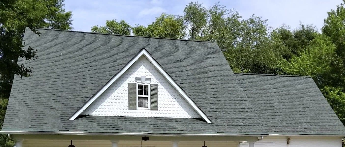 residential roof of home with gray asphalt shingles