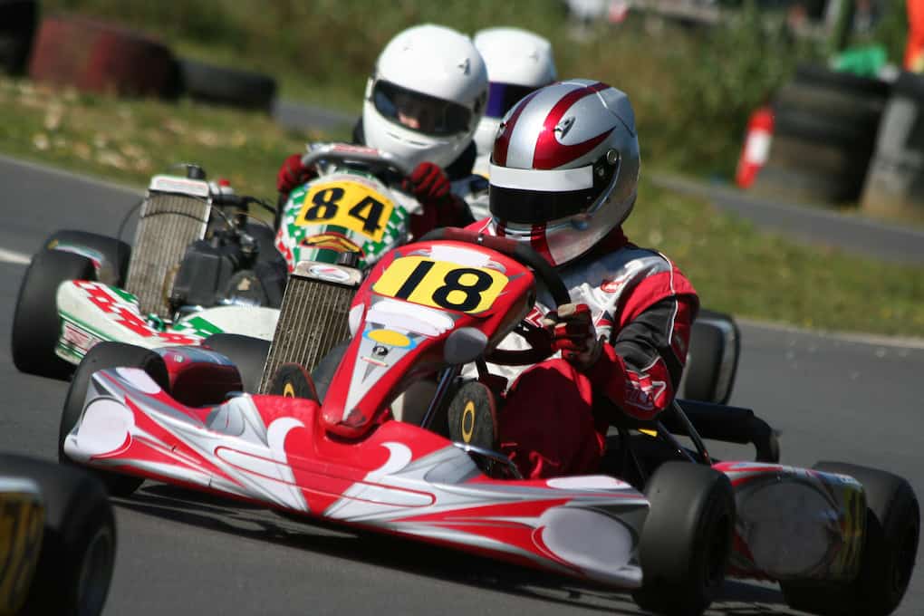 Close-up action of a go-kart race; things to do in Mooresville