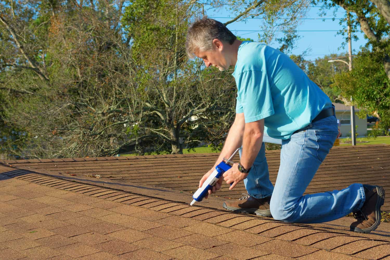 roof leak repair patching a roof flashing and shingles