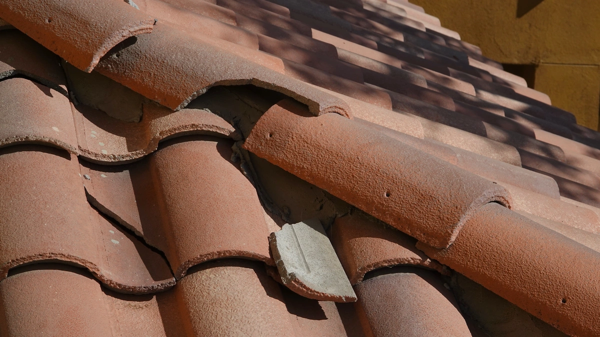 roof damage dealing with cracked tile