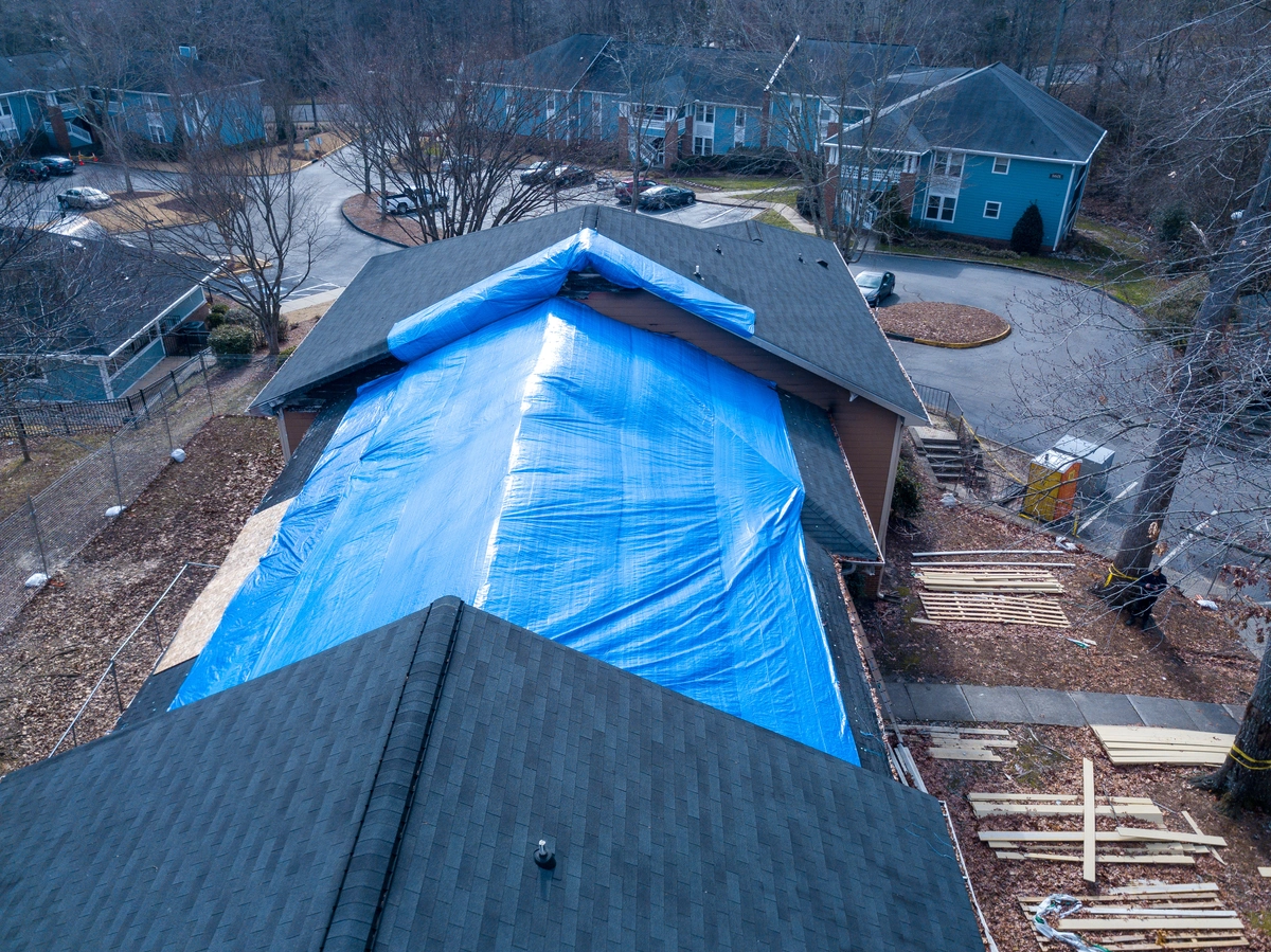 tarp installed over roof leak