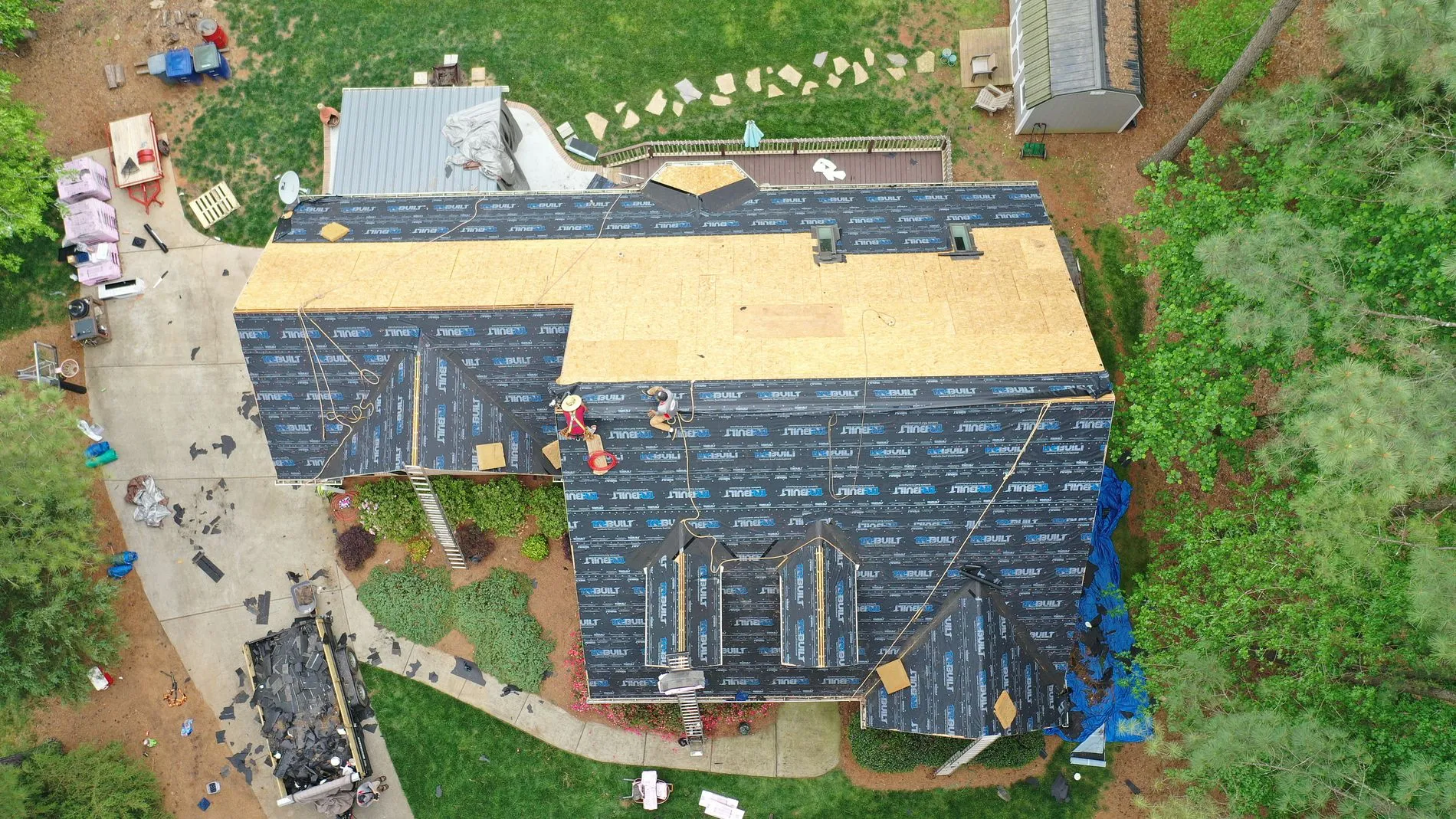 arial view of tidds roofing replacing roof and repairing storm damage