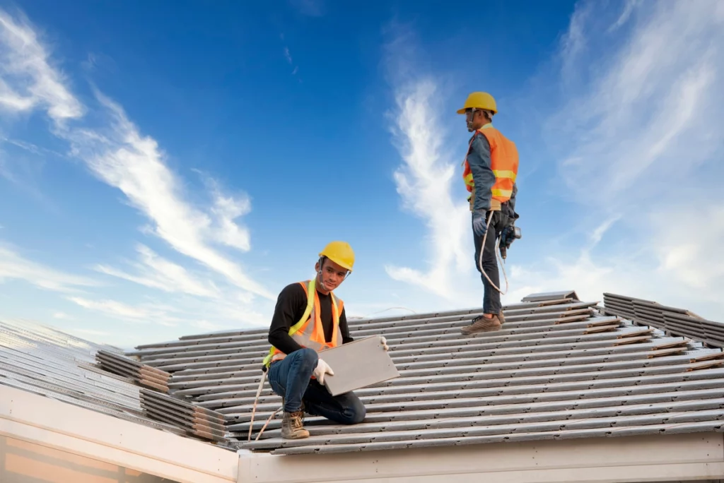 engineers workers installing new roof 