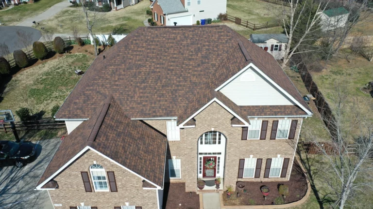 brown shingles on large house