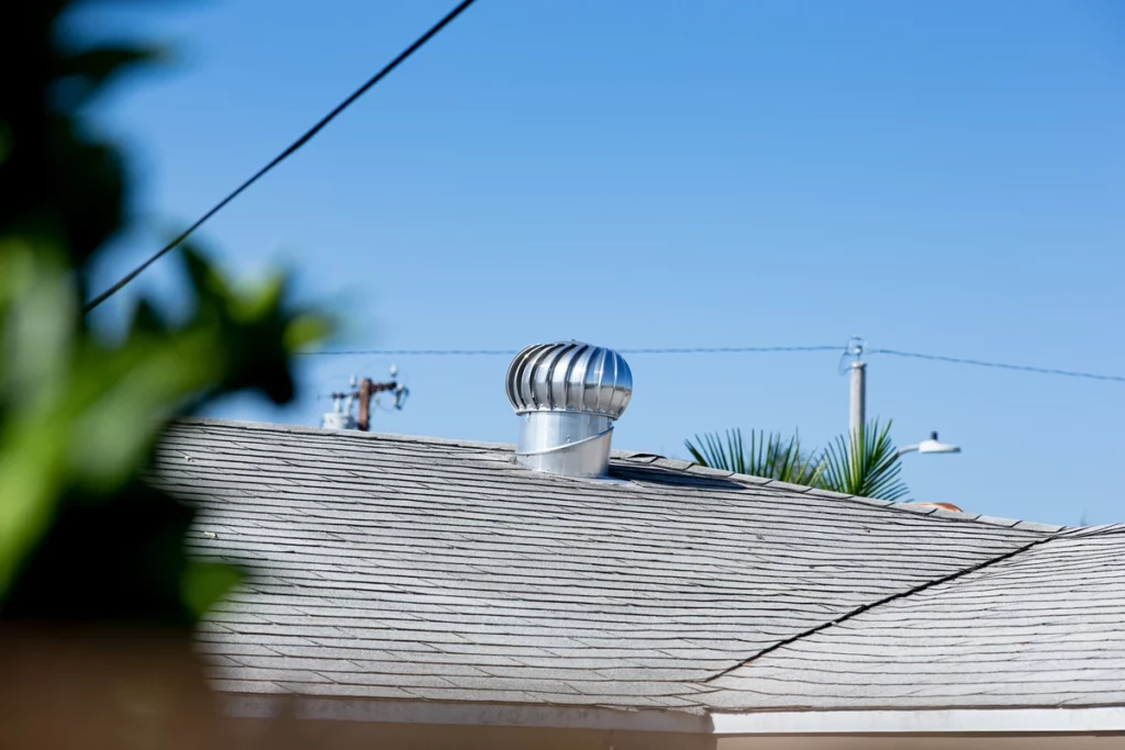asphalt house roof with a turbine vent