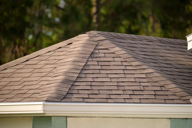 close up to brown asphalt shingle roof